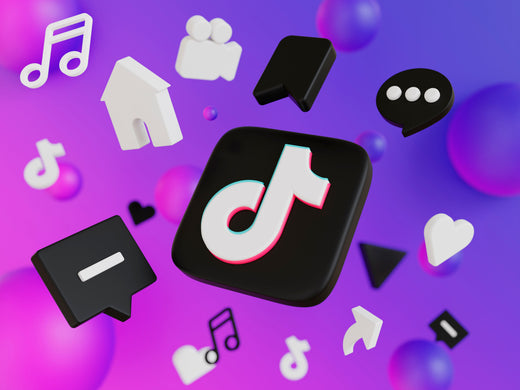 TikTok logo surrounded by 3D social media icons on a pink-purple gradient background.