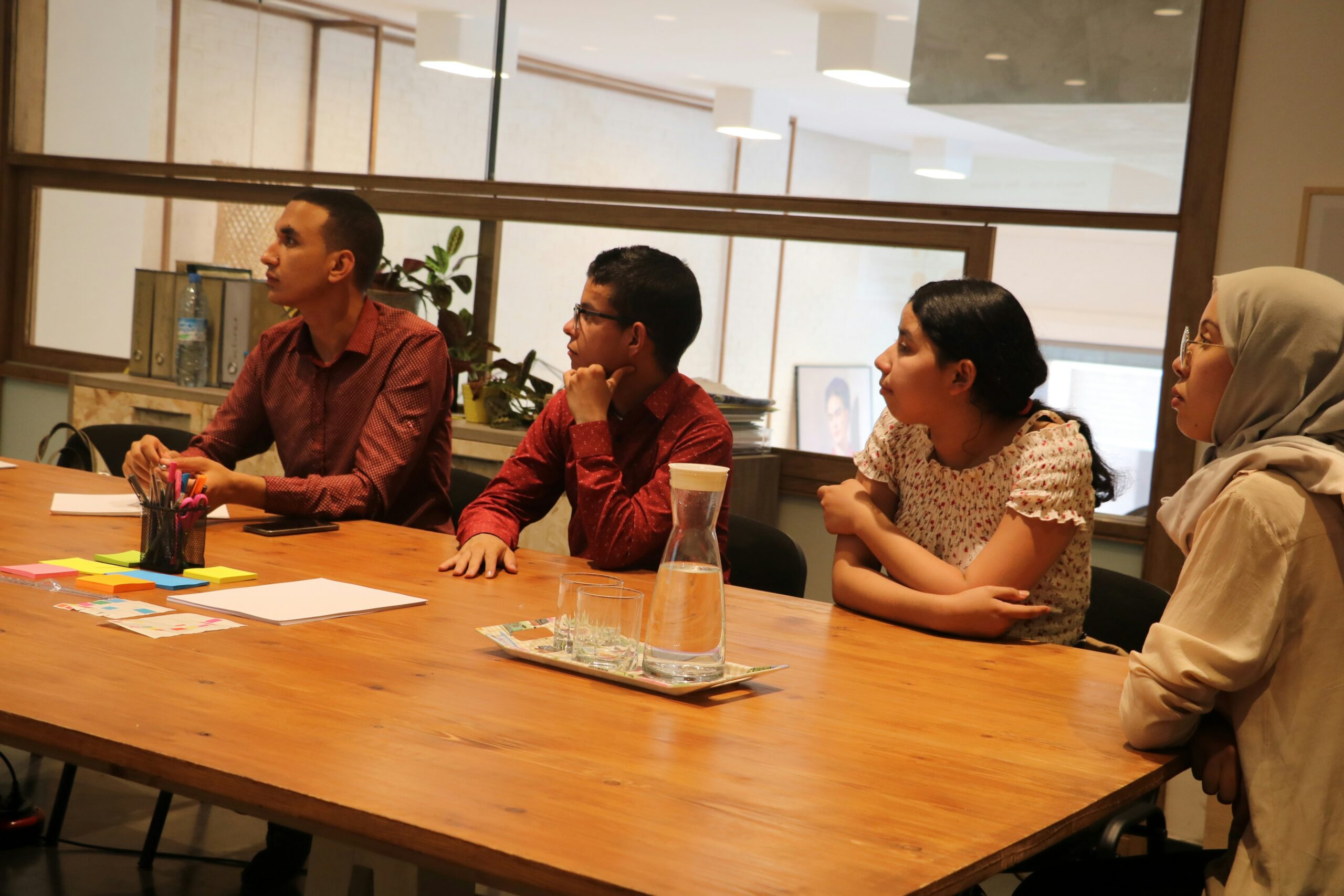 Marketing team collaborating on digital campaigns aligned with cause related marketing and ethical brand initiatives