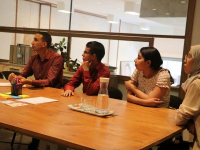 Marketing team collaborating on digital campaigns aligned with cause related marketing and ethical brand initiatives